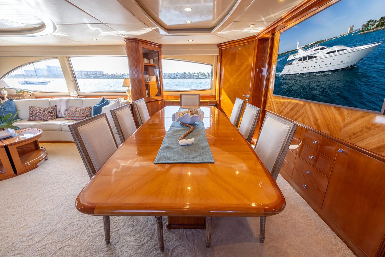 a table with chairs around it aboard ENDLESS SUN Yacht for Sale
