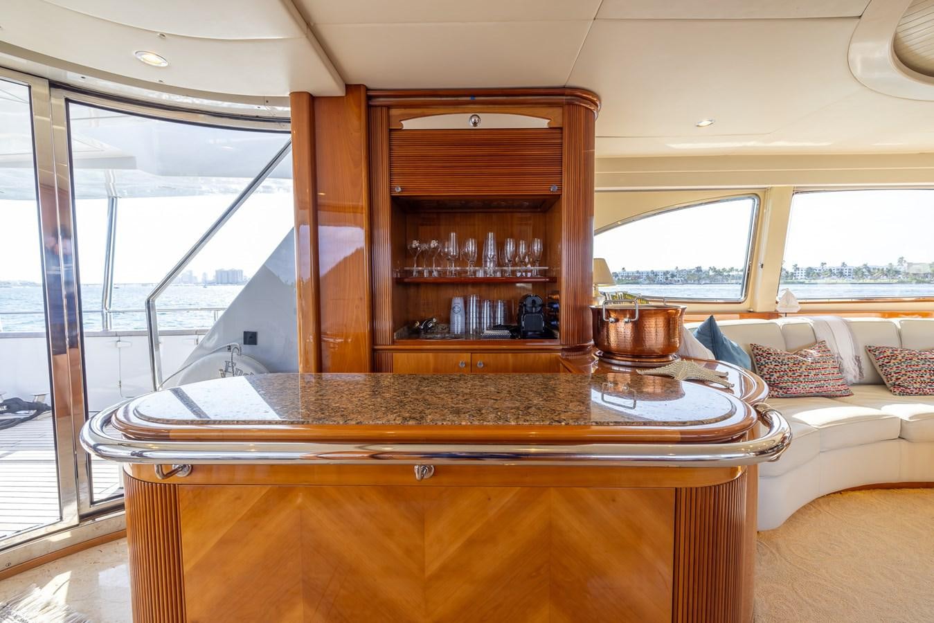 a glass cabinet in a room aboard ENDLESS SUN Yacht for Sale