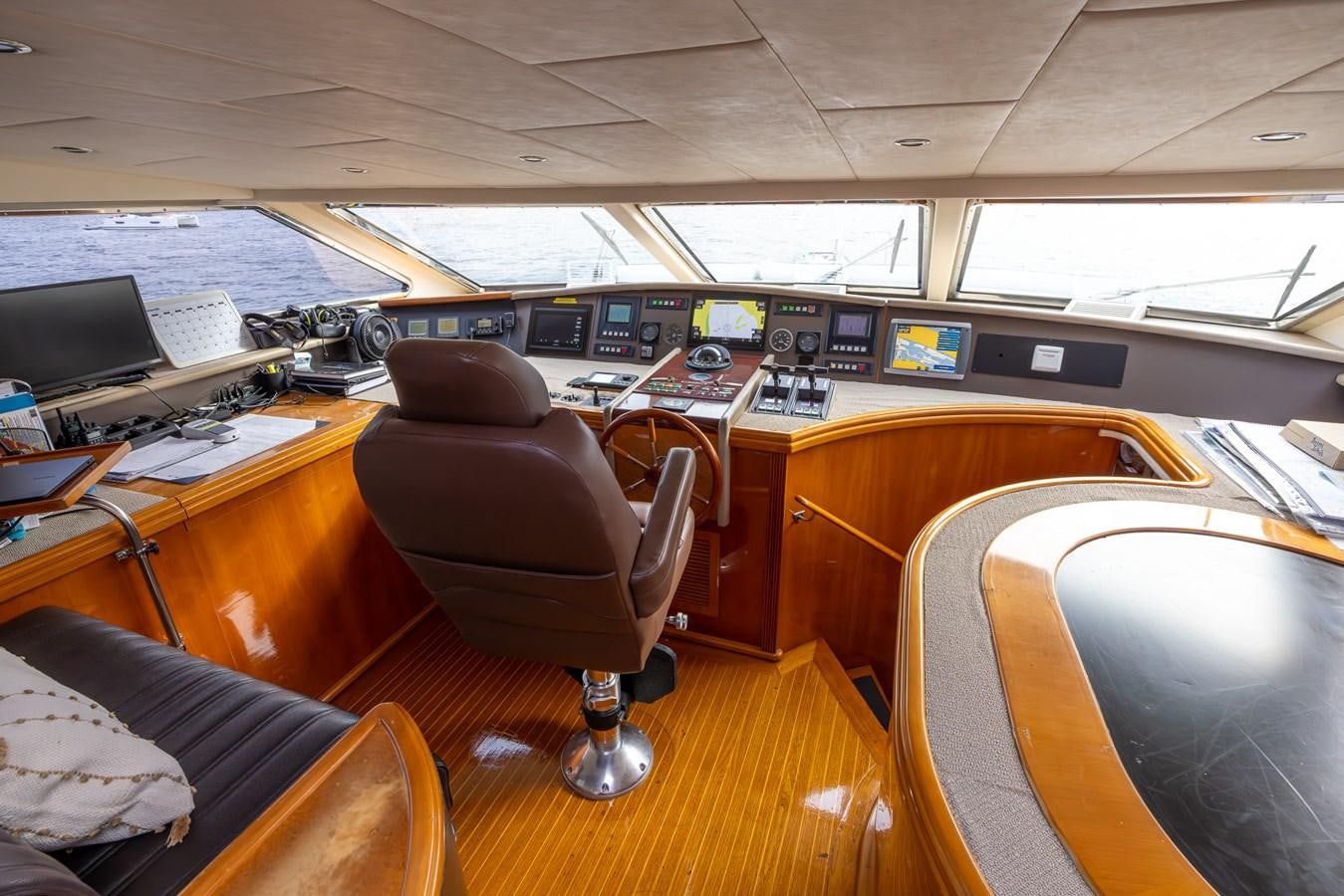 a room with a desk and chairs aboard ENDLESS SUN Yacht for Sale