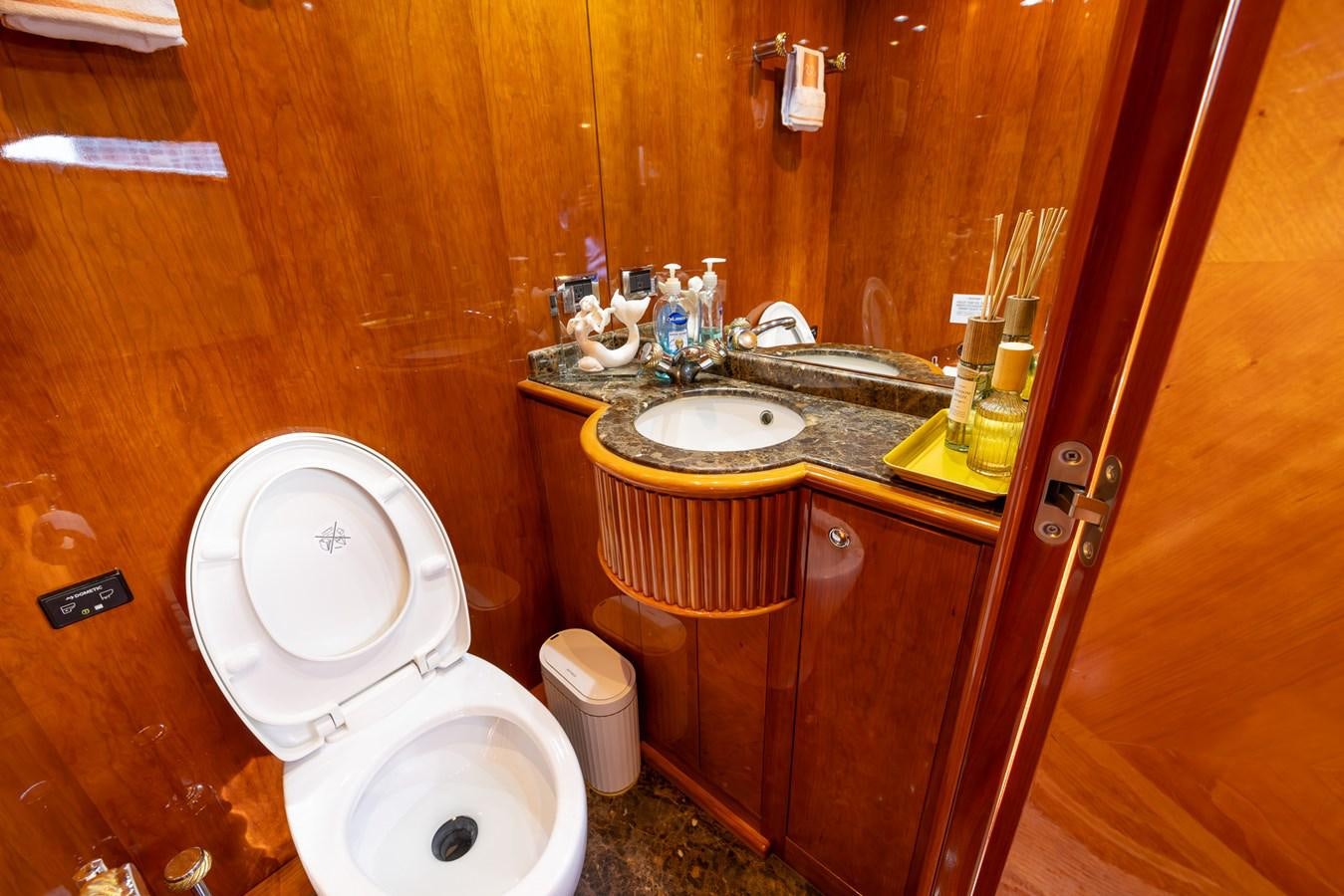 a bathroom with a sink and a toilet aboard ENDLESS SUN Yacht for Sale