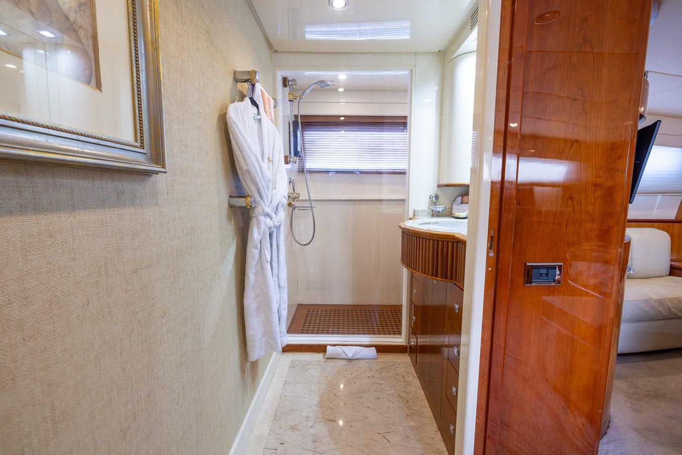 a bathroom with a sink and a mirror aboard ENDLESS SUN Yacht for Sale