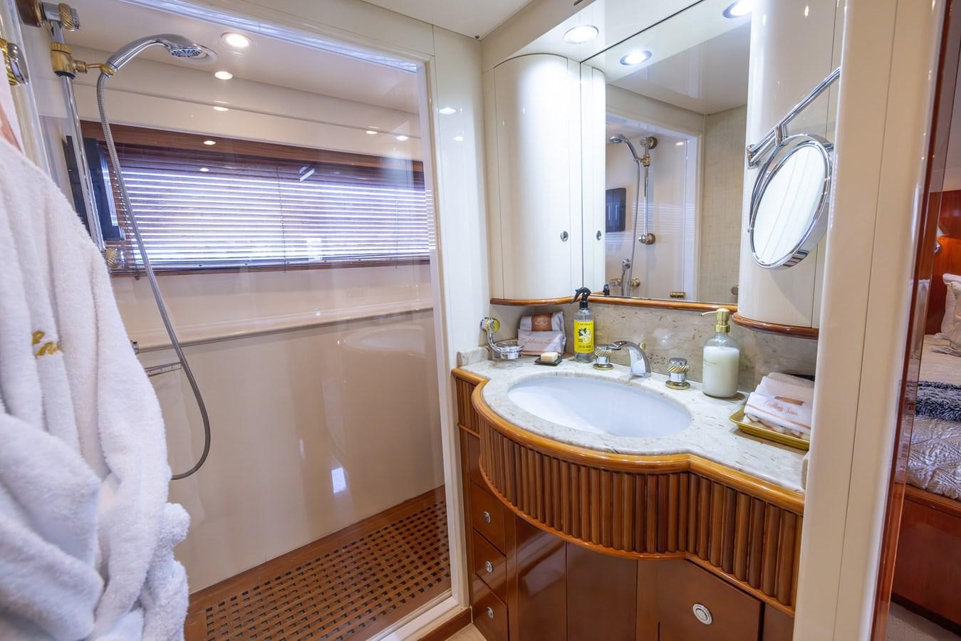 a bathroom with a sink and a shower aboard ENDLESS SUN Yacht for Sale