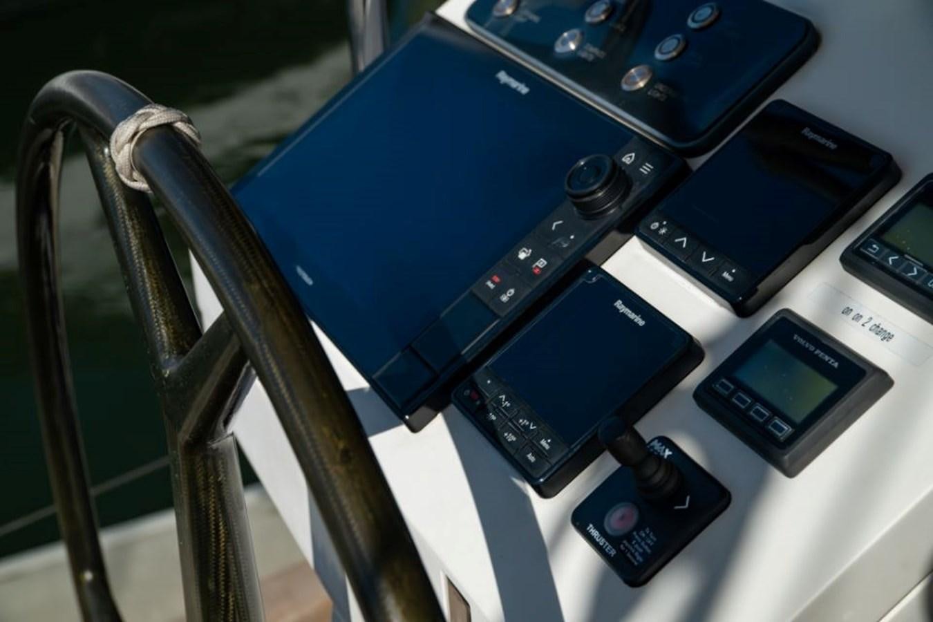 a group of cell phones on a table aboard SAPPHIRE II OF LONDON Yacht for Sale