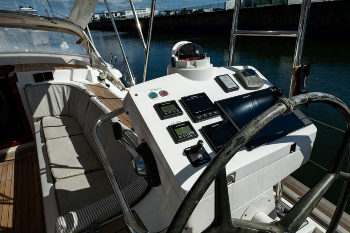 a white car with a black steering wheel and a white interior aboard SAPPHIRE II OF LONDON Yacht for Sale