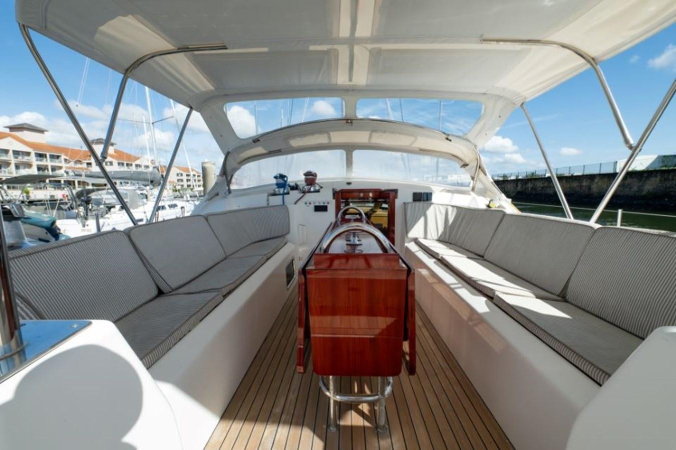 a boat with a red seat aboard SAPPHIRE II OF LONDON Yacht for Sale
