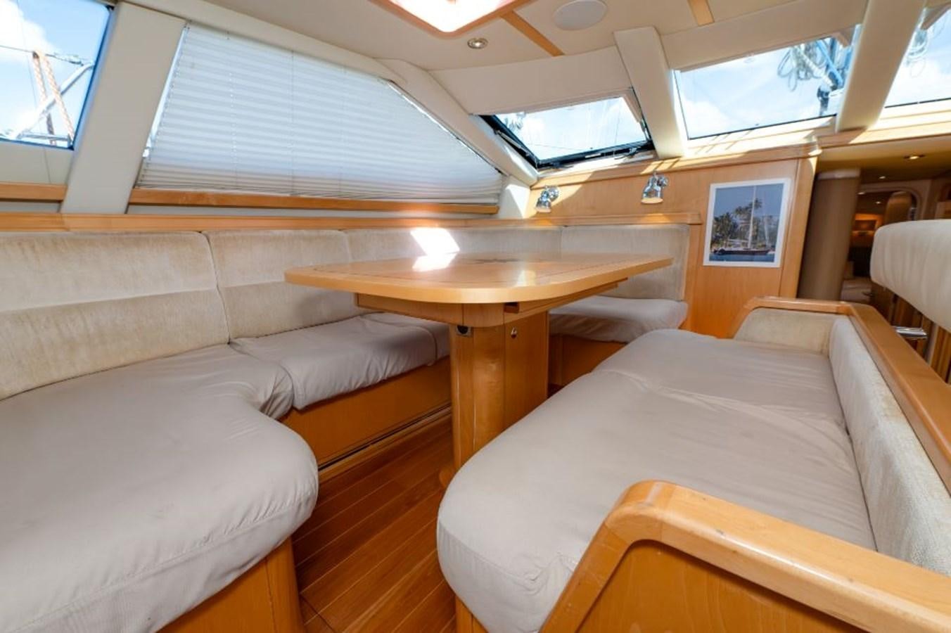 a room with a couch and a table aboard SAPPHIRE II OF LONDON Yacht for Sale