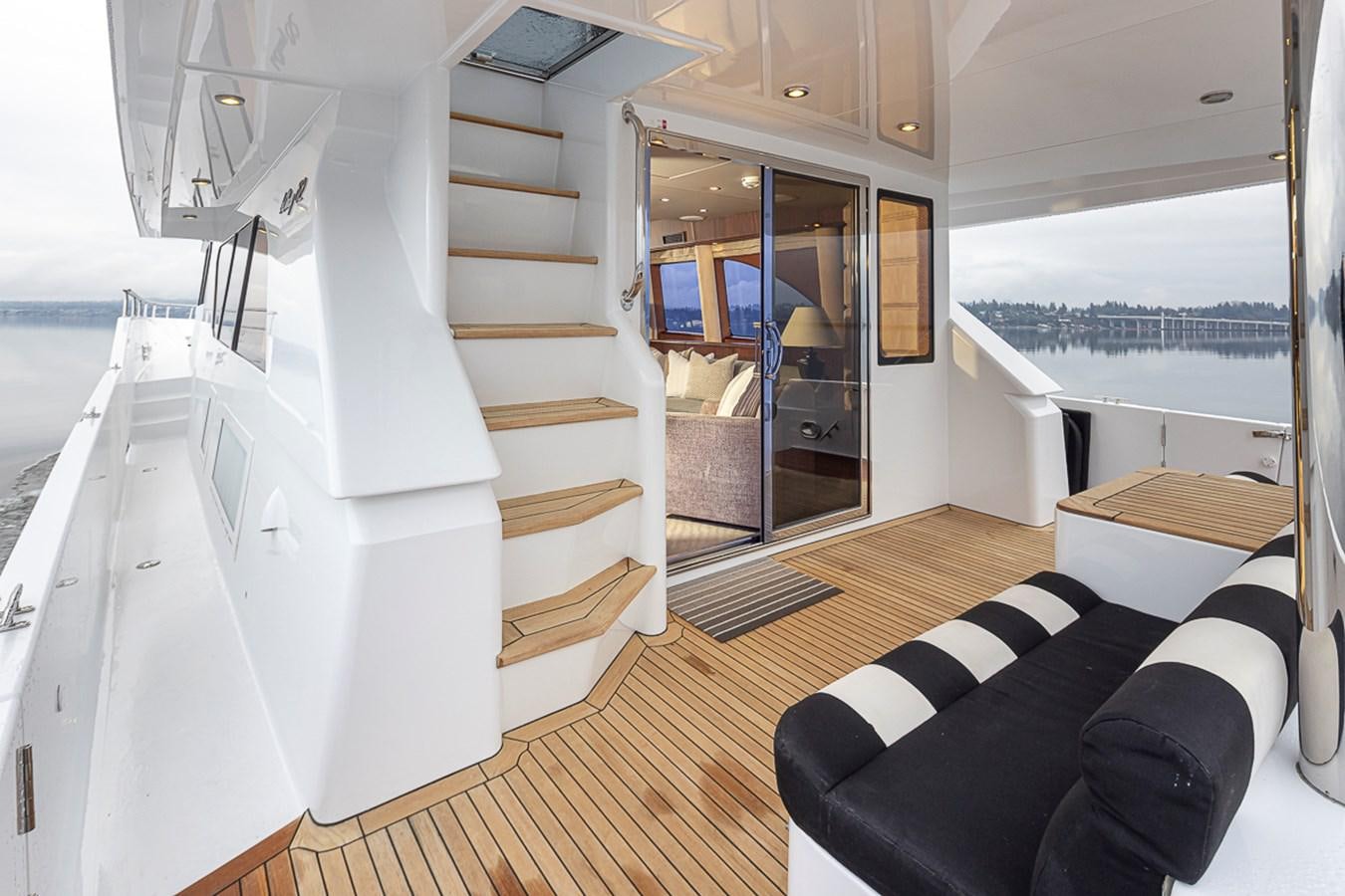 a room with a staircase and a glass door aboard SEA SPUR Yacht for Sale