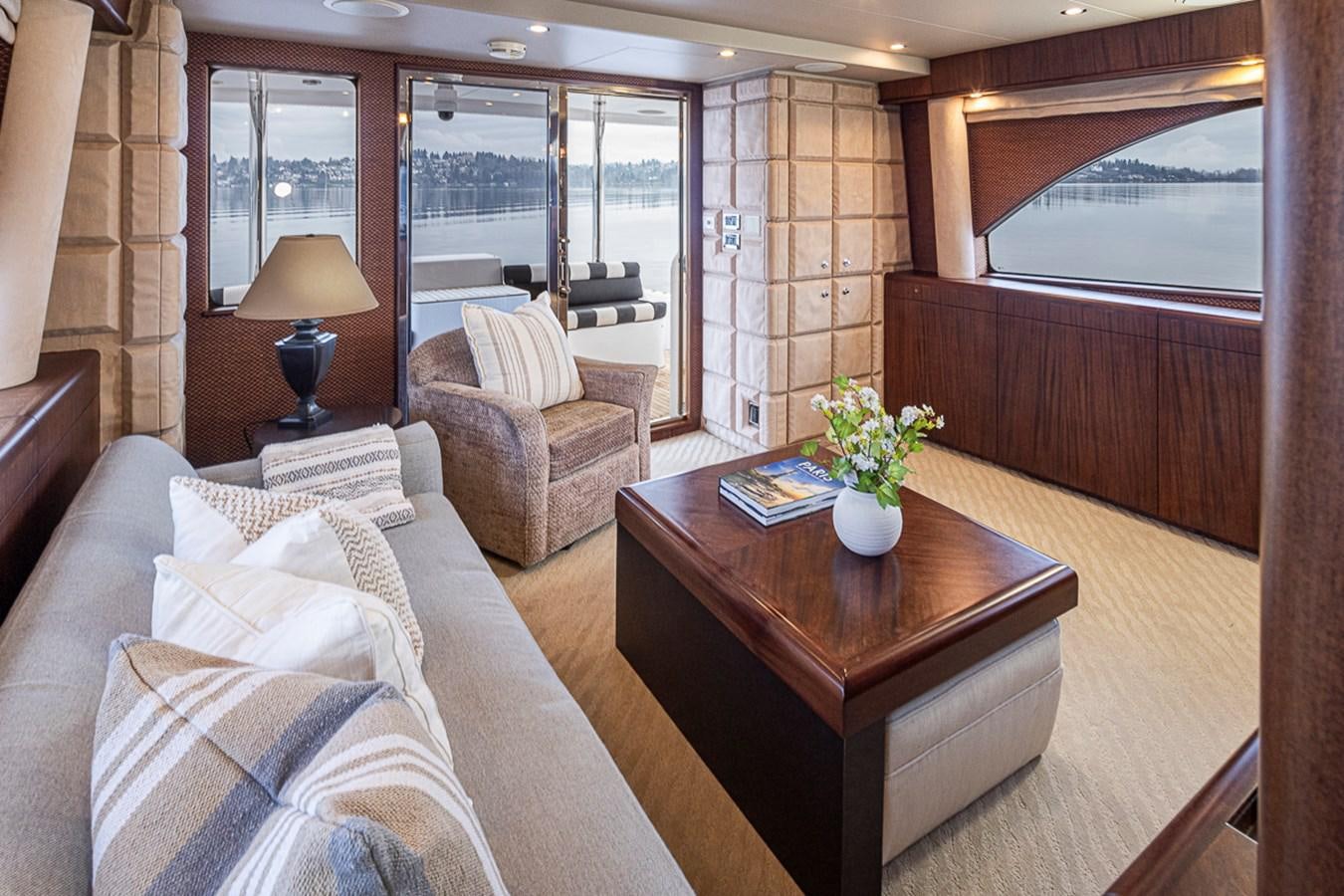 a room with a table and chairs aboard SEA SPUR Yacht for Sale