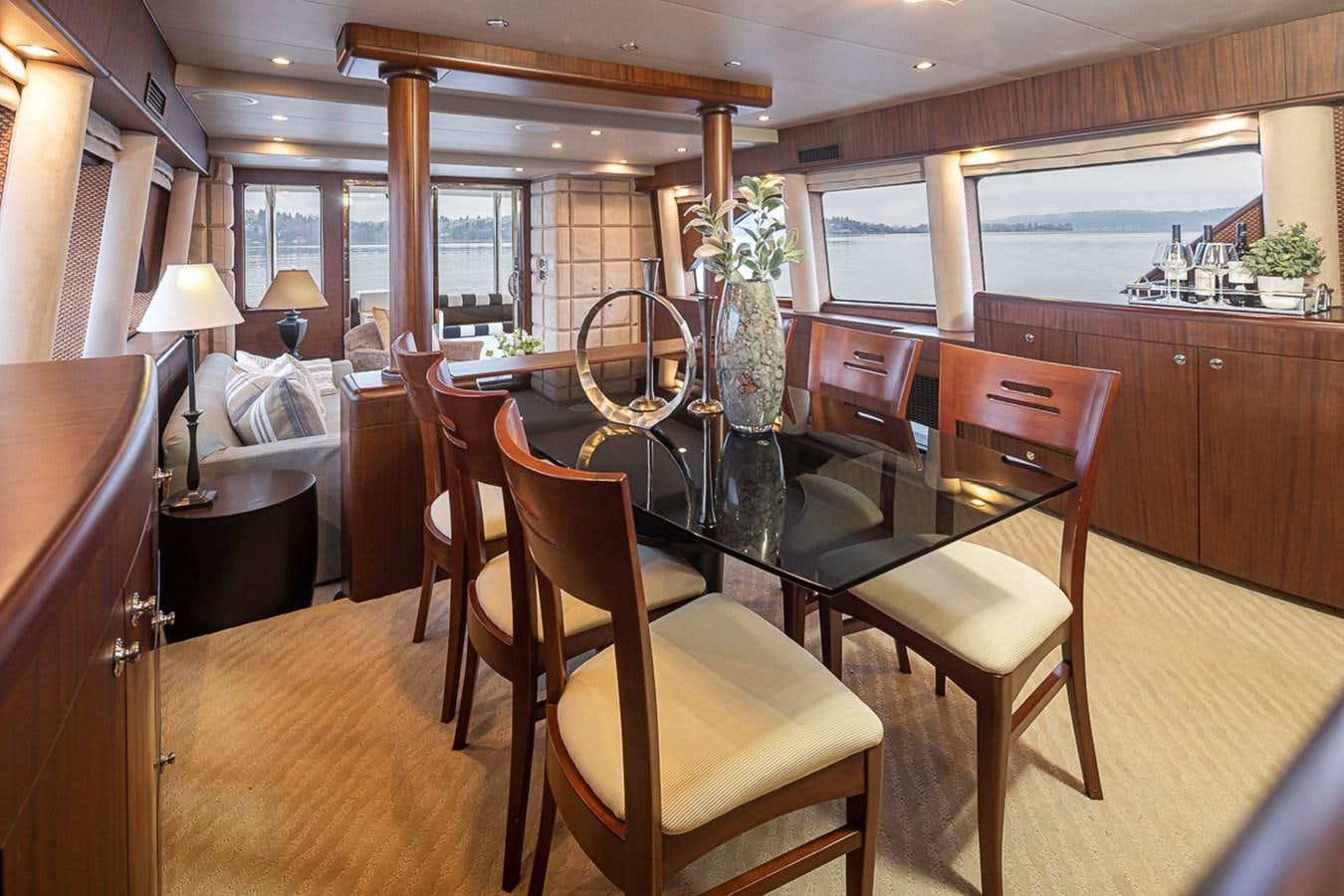 a dining room with a table aboard SEA SPUR Yacht for Sale