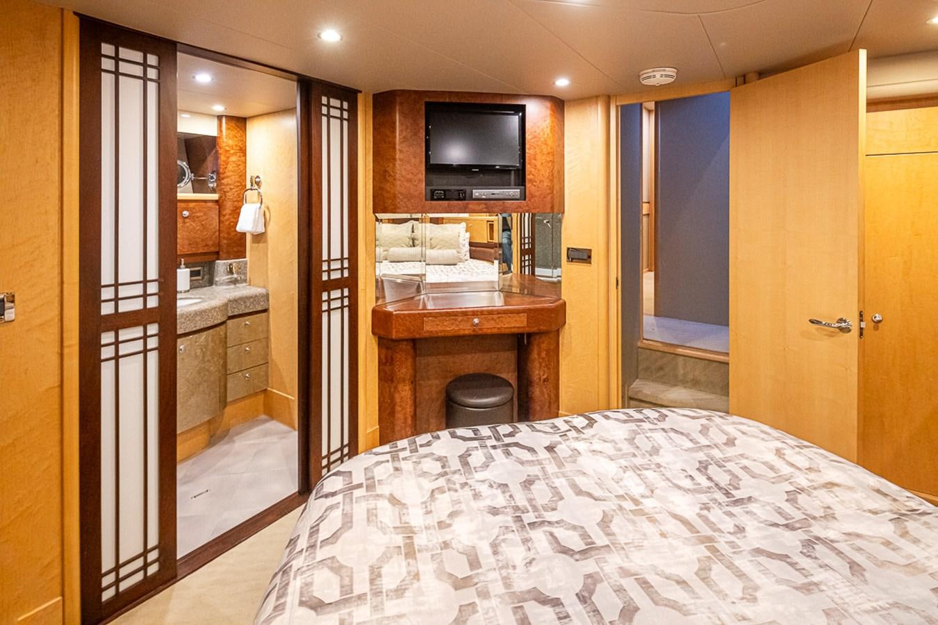a bedroom with a bed aboard SEA SPUR Yacht for Sale