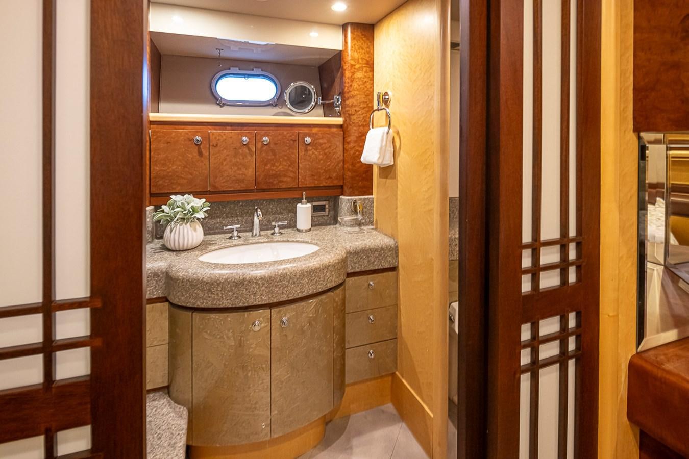 a bathroom with a sink and cabinets aboard SEA SPUR Yacht for Sale