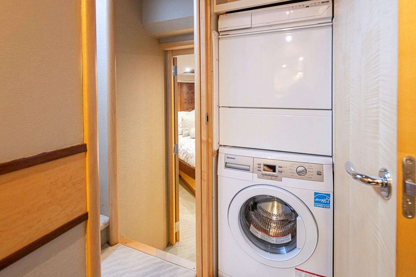 a washing machine in a room aboard SEA SPUR Yacht for Sale