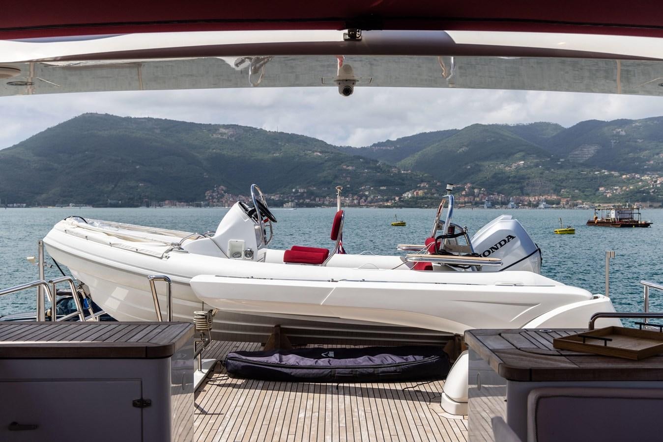 a boat docked at a pier aboard JASMINE LUNA Yacht for Sale