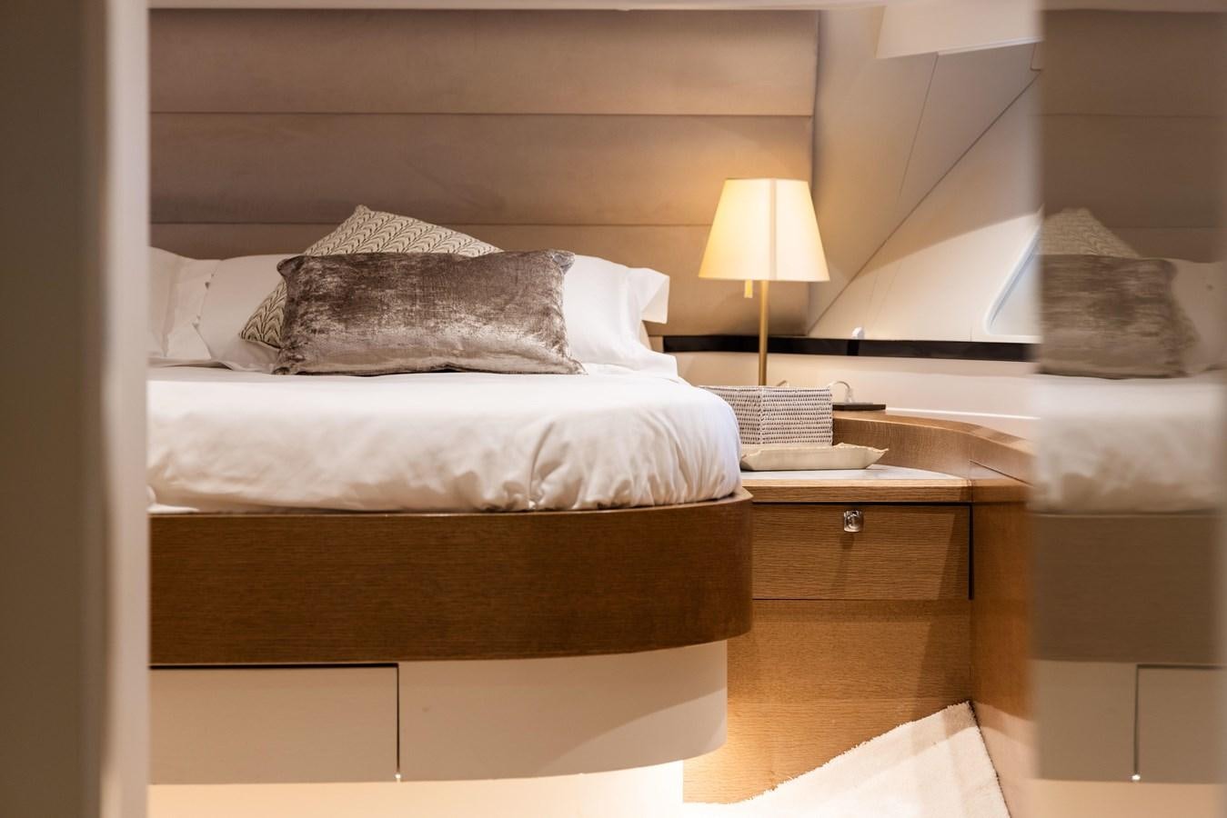 a bed with pillows aboard JASMINE LUNA Yacht for Sale