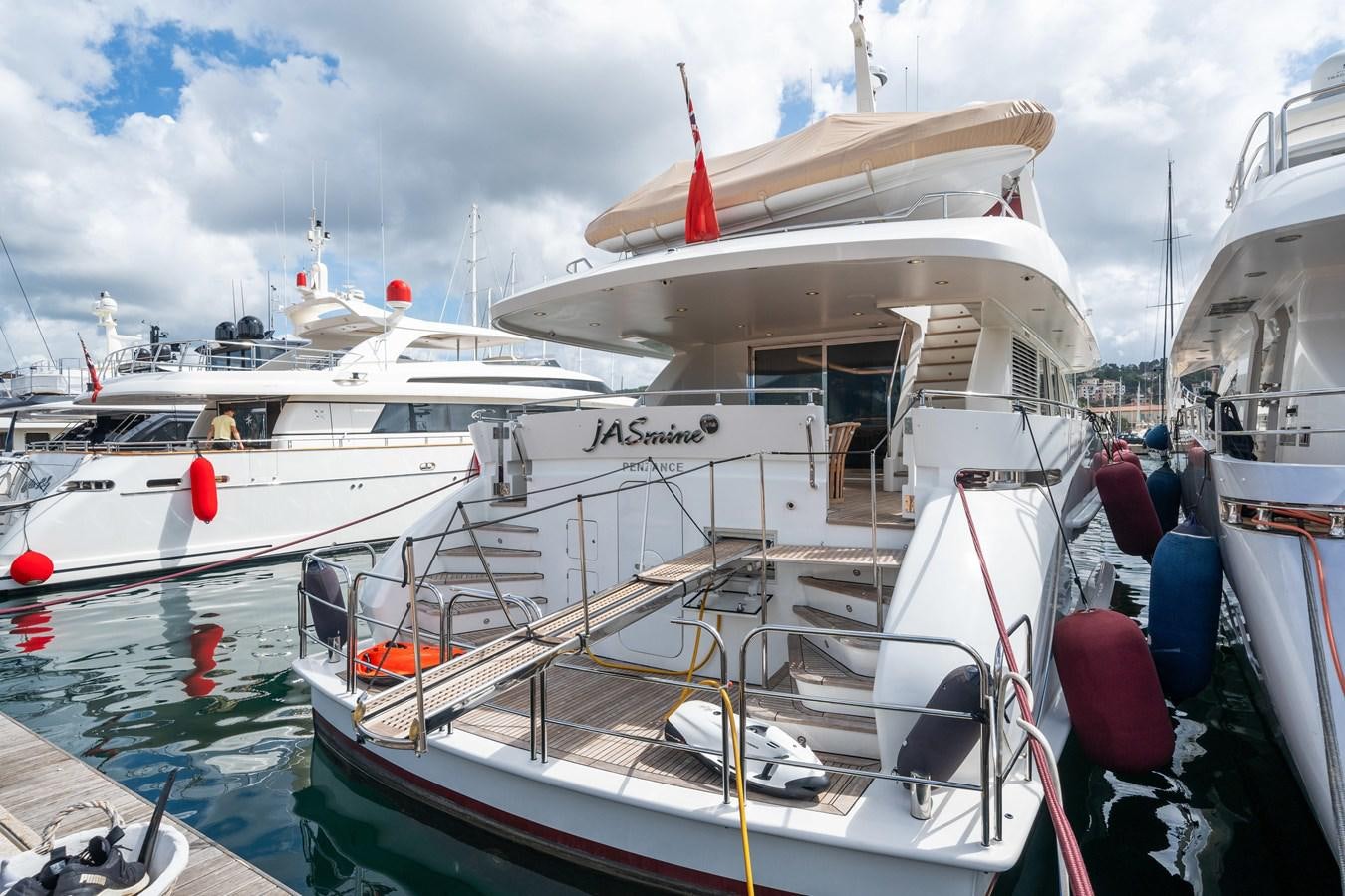 a boat docked at a dock aboard JASMINE LUNA Yacht for Sale