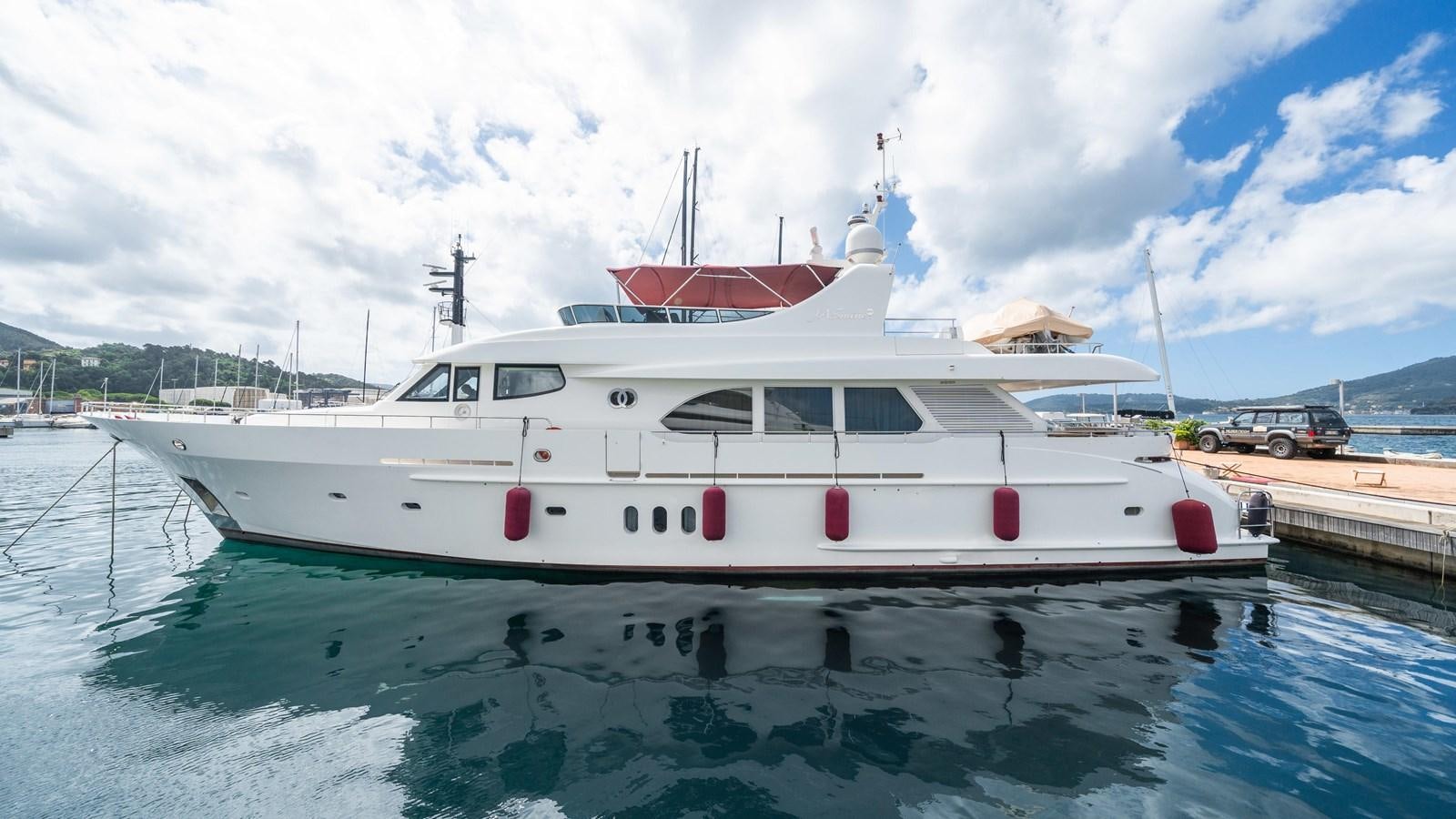 a white yacht docked aboard JASMINE LUNA Yacht for Sale
