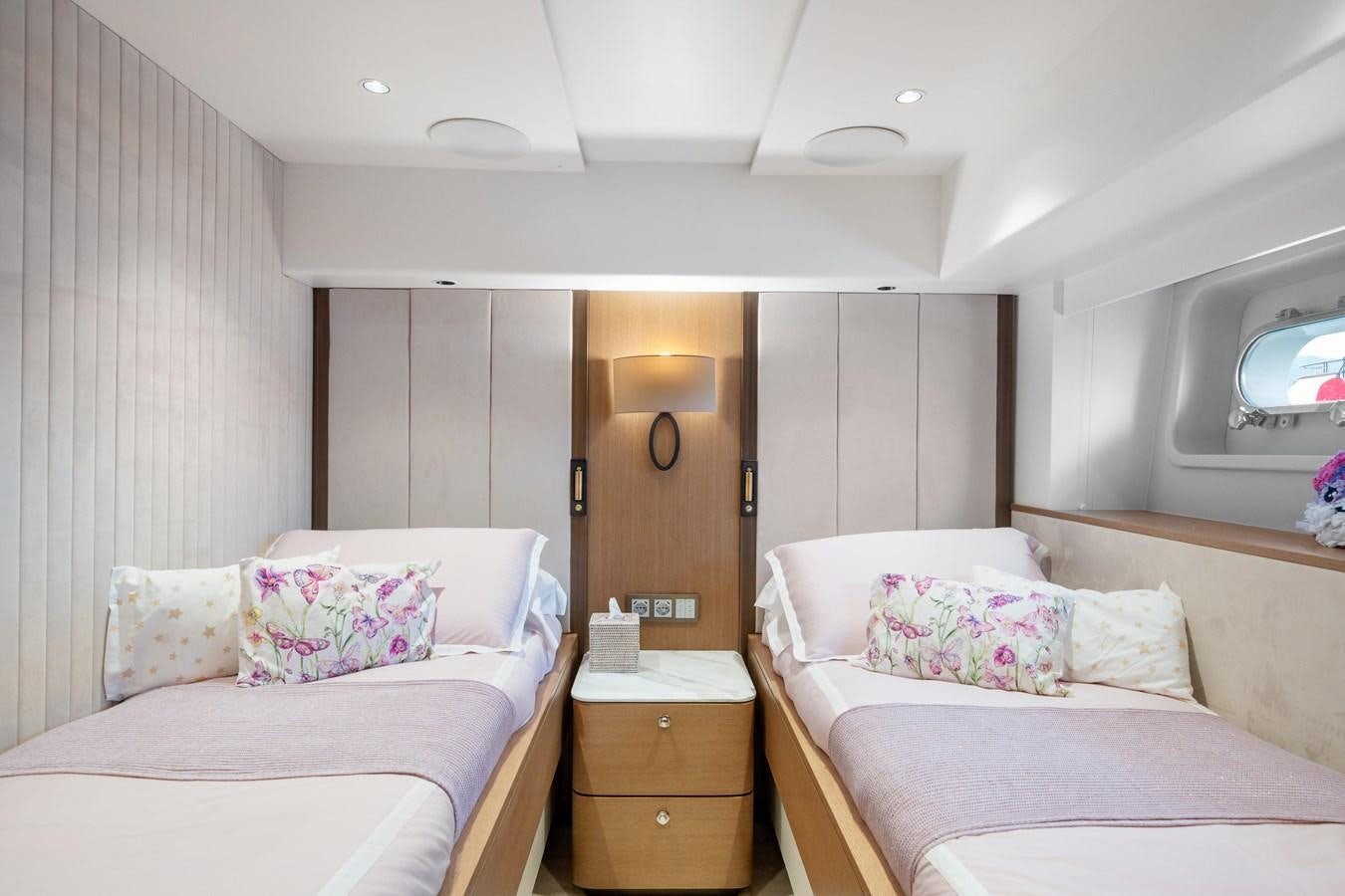 a room with two beds aboard JASMINE LUNA Yacht for Sale