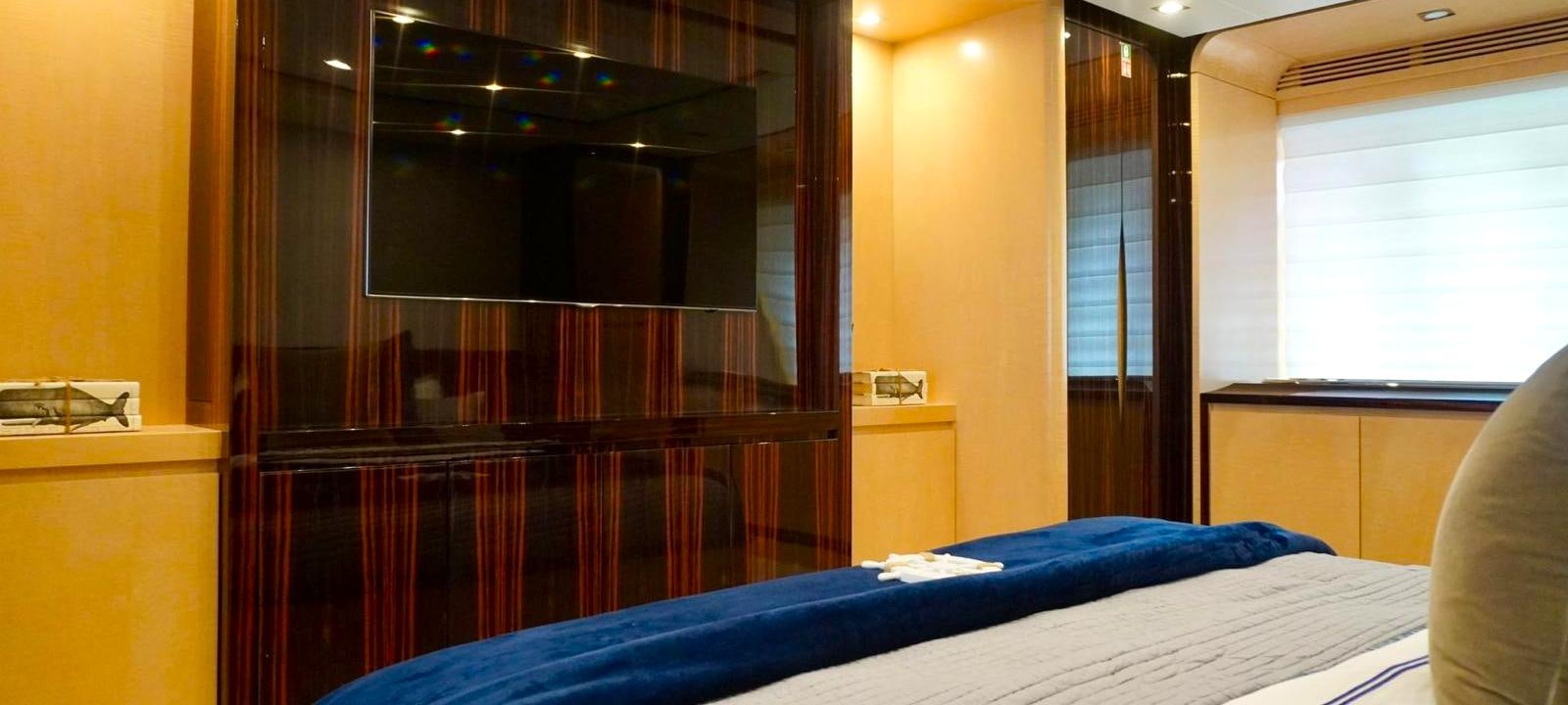 a bed in a room aboard OUR TIME Yacht for Sale