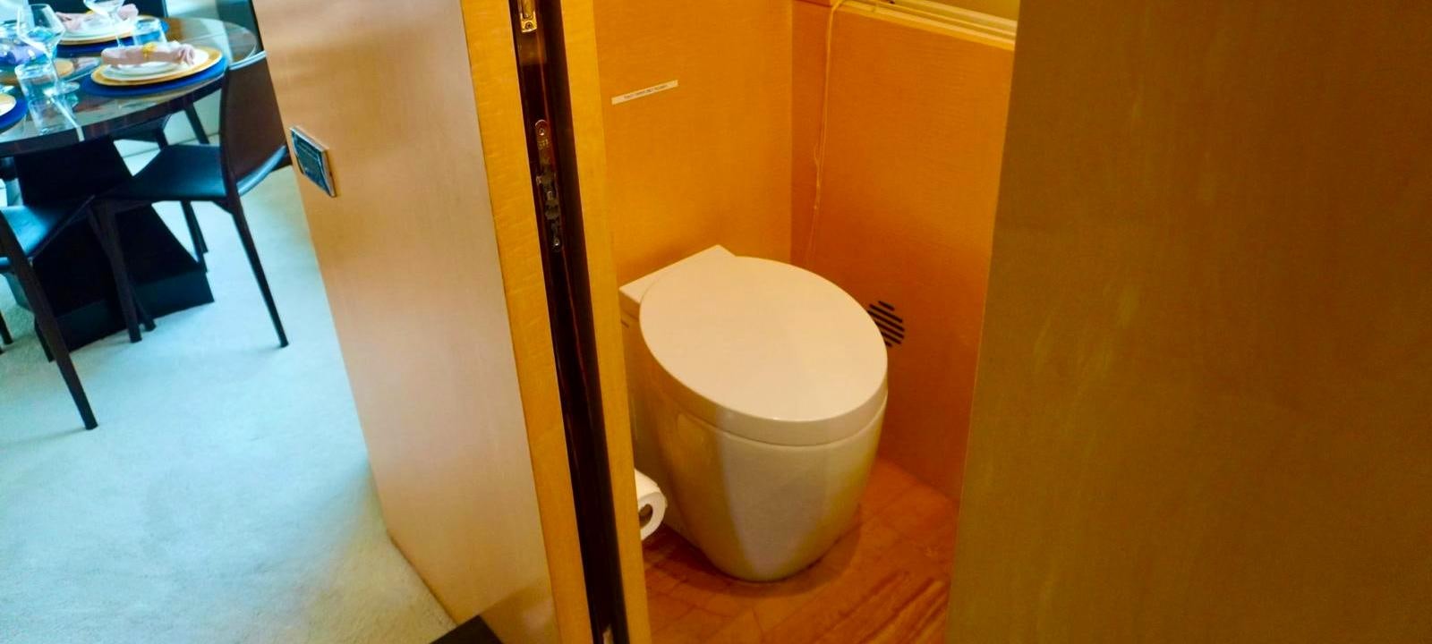 a toilet in a room aboard OUR TIME Yacht for Sale