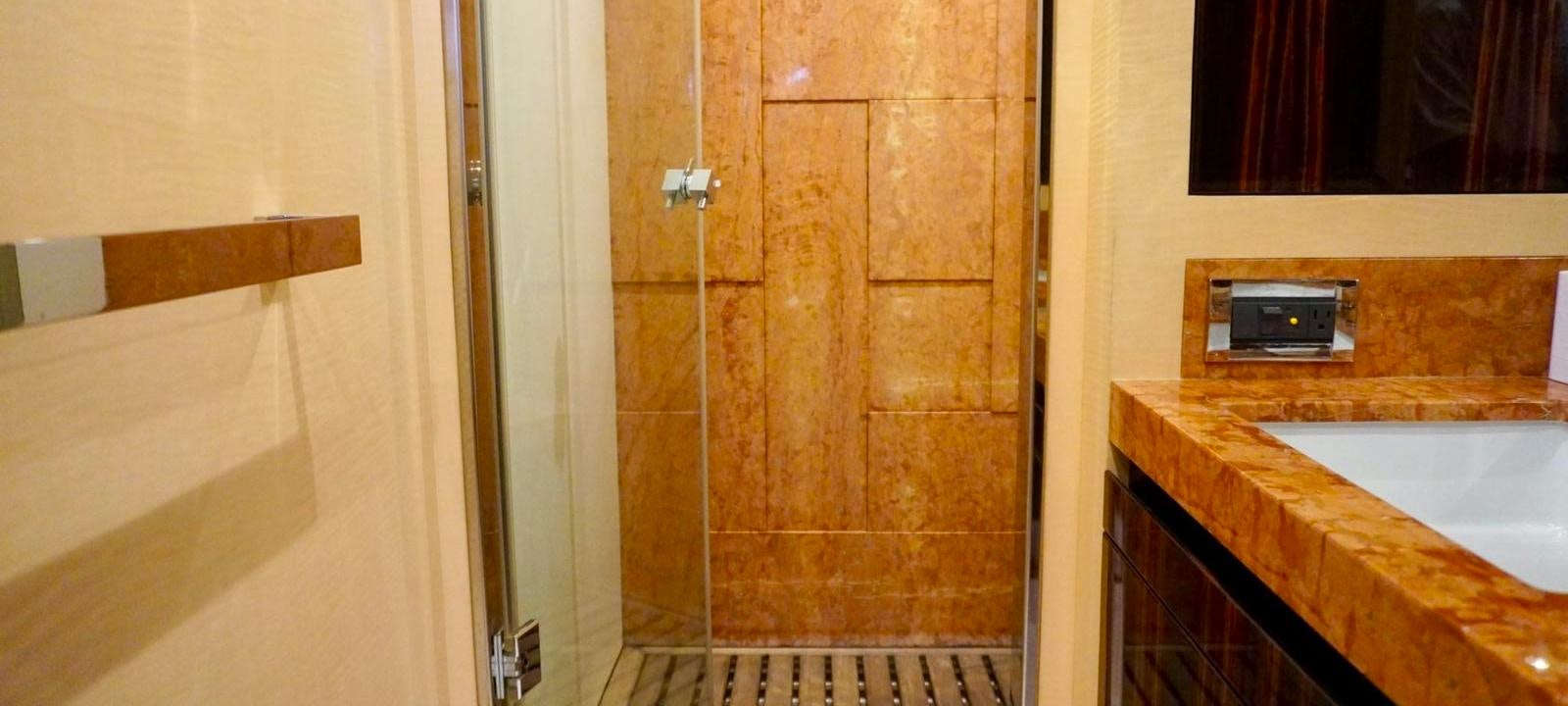 a bathroom with a sink and a microwave aboard OUR TIME Yacht for Sale