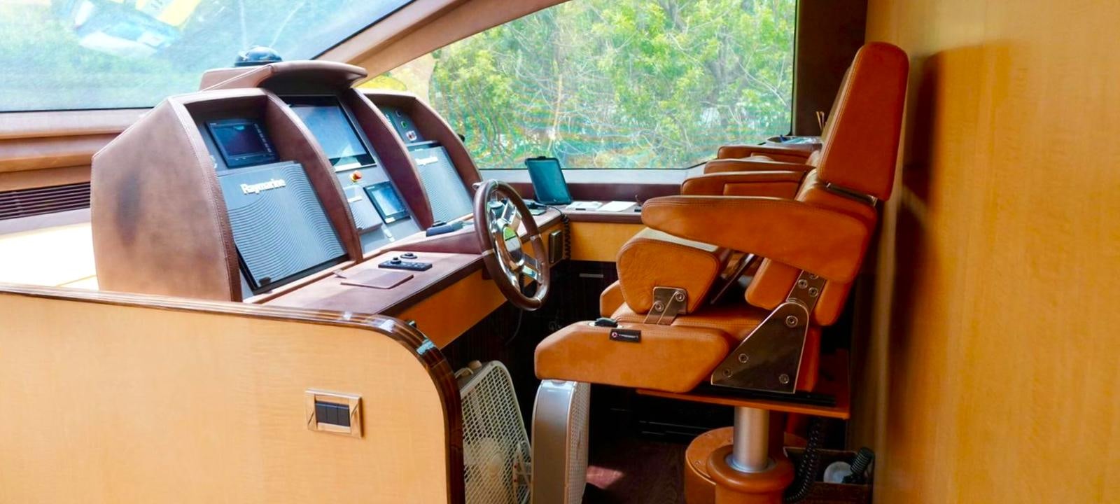 a car with a seat open aboard OUR TIME Yacht for Sale