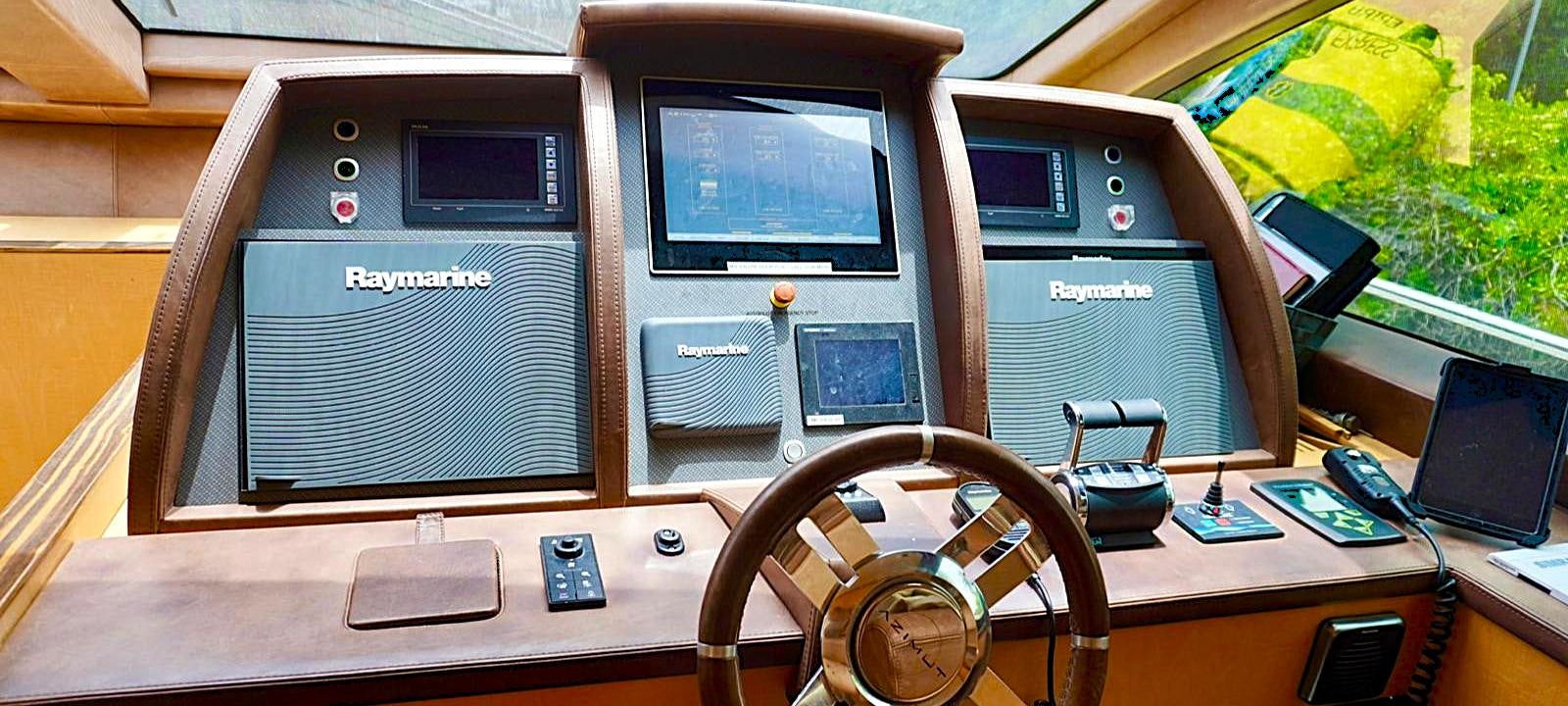 a computer with a screen and a monitor aboard OUR TIME Yacht for Sale