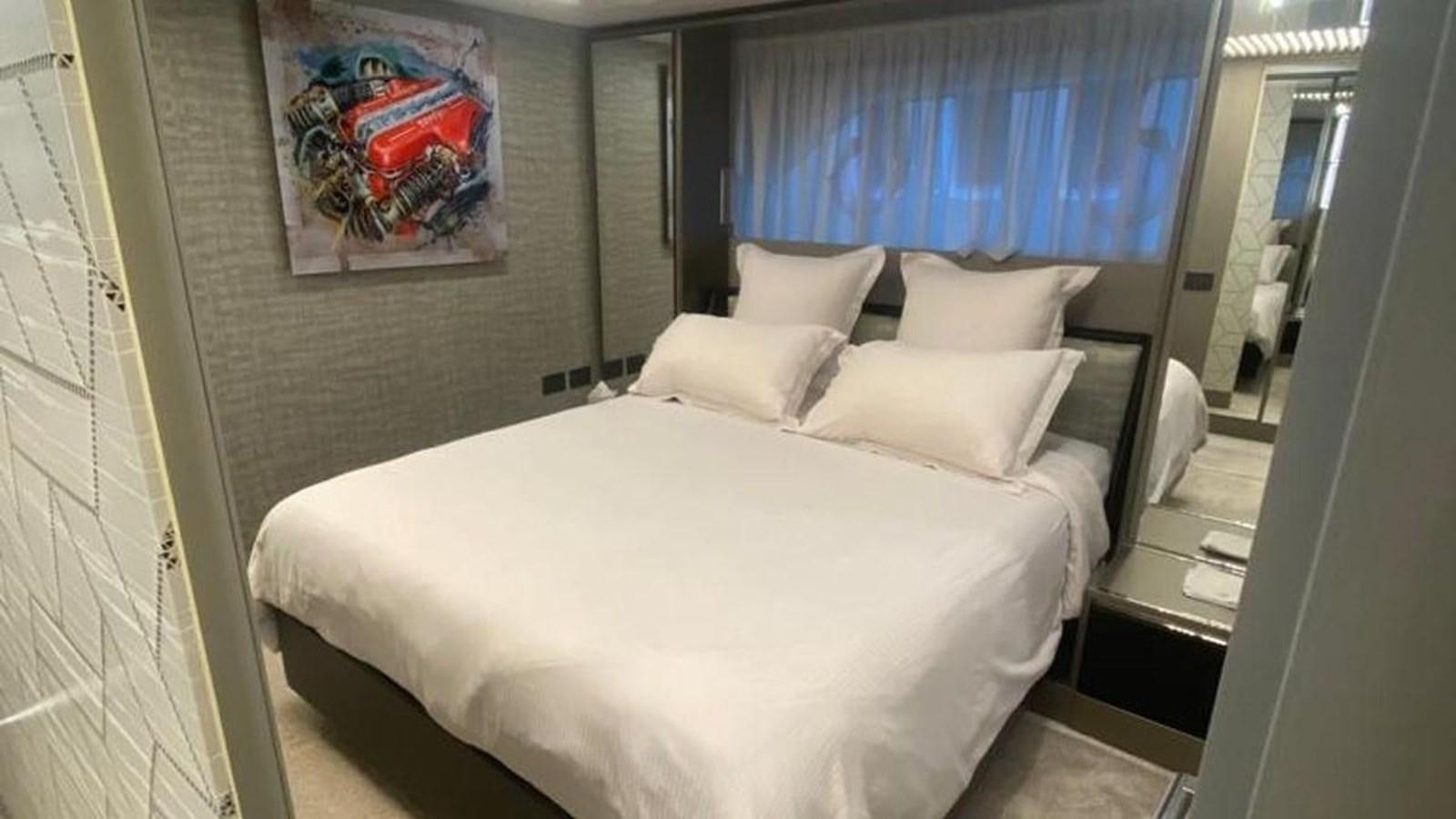 a bed in a room aboard NUMERO 5 Yacht for Sale