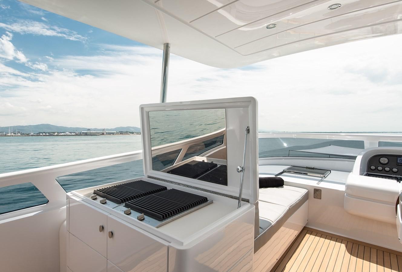 a laptop on a boat aboard MIREDO Yacht for Sale