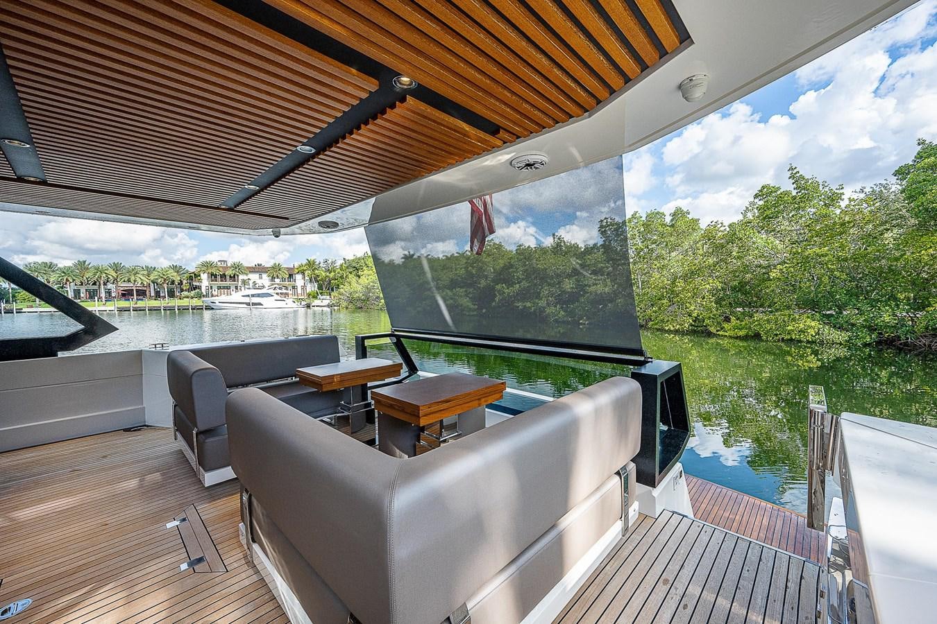 a large balcony overlooking a lake aboard SO SO NICE Yacht for Sale