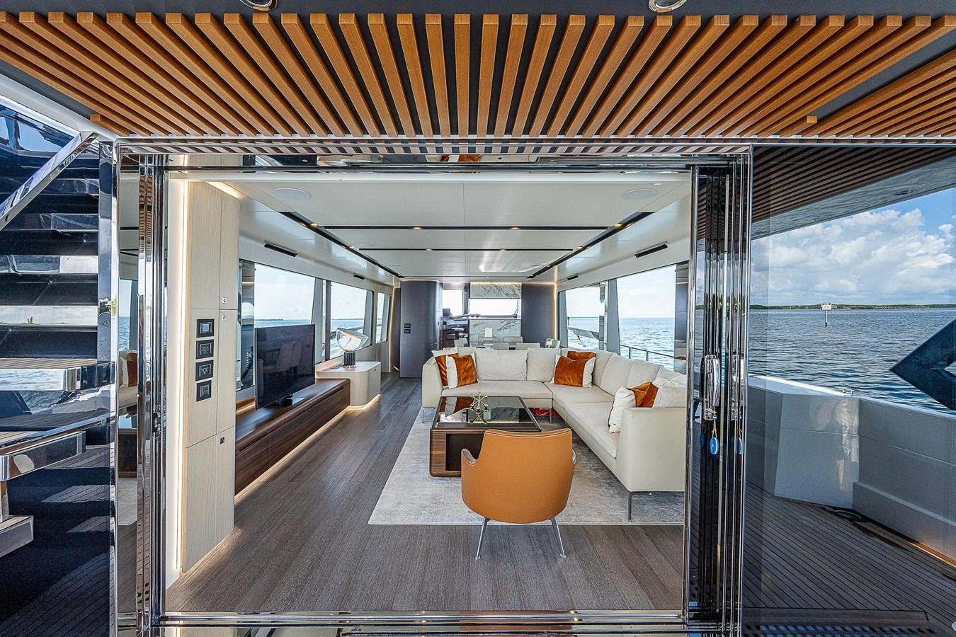 a room with a couch and a table aboard SO SO NICE Yacht for Sale