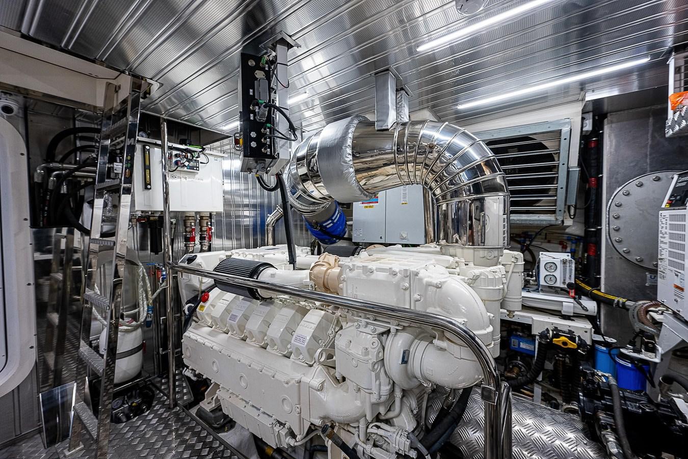 a large white machine in a room aboard SO SO NICE Yacht for Sale