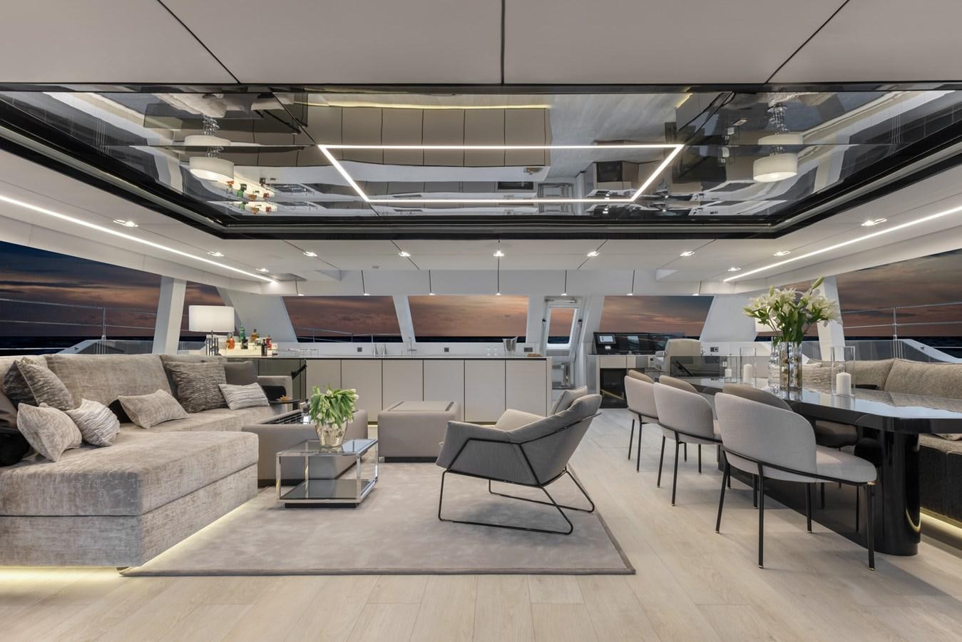 a modern looking living room aboard SUNREEF 80 POWER Yacht for Sale