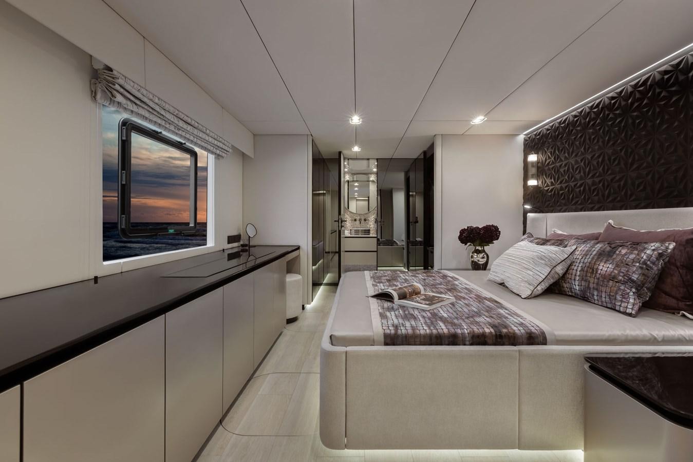 a bedroom with a large bed aboard SUNREEF 80 POWER Yacht for Sale