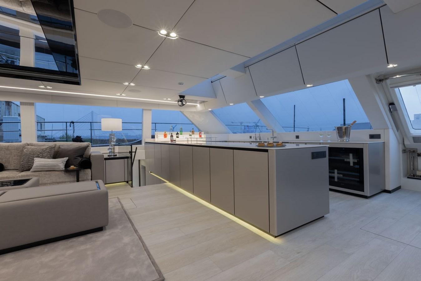 a large kitchen with a large island aboard SUNREEF 80 POWER Yacht for Sale