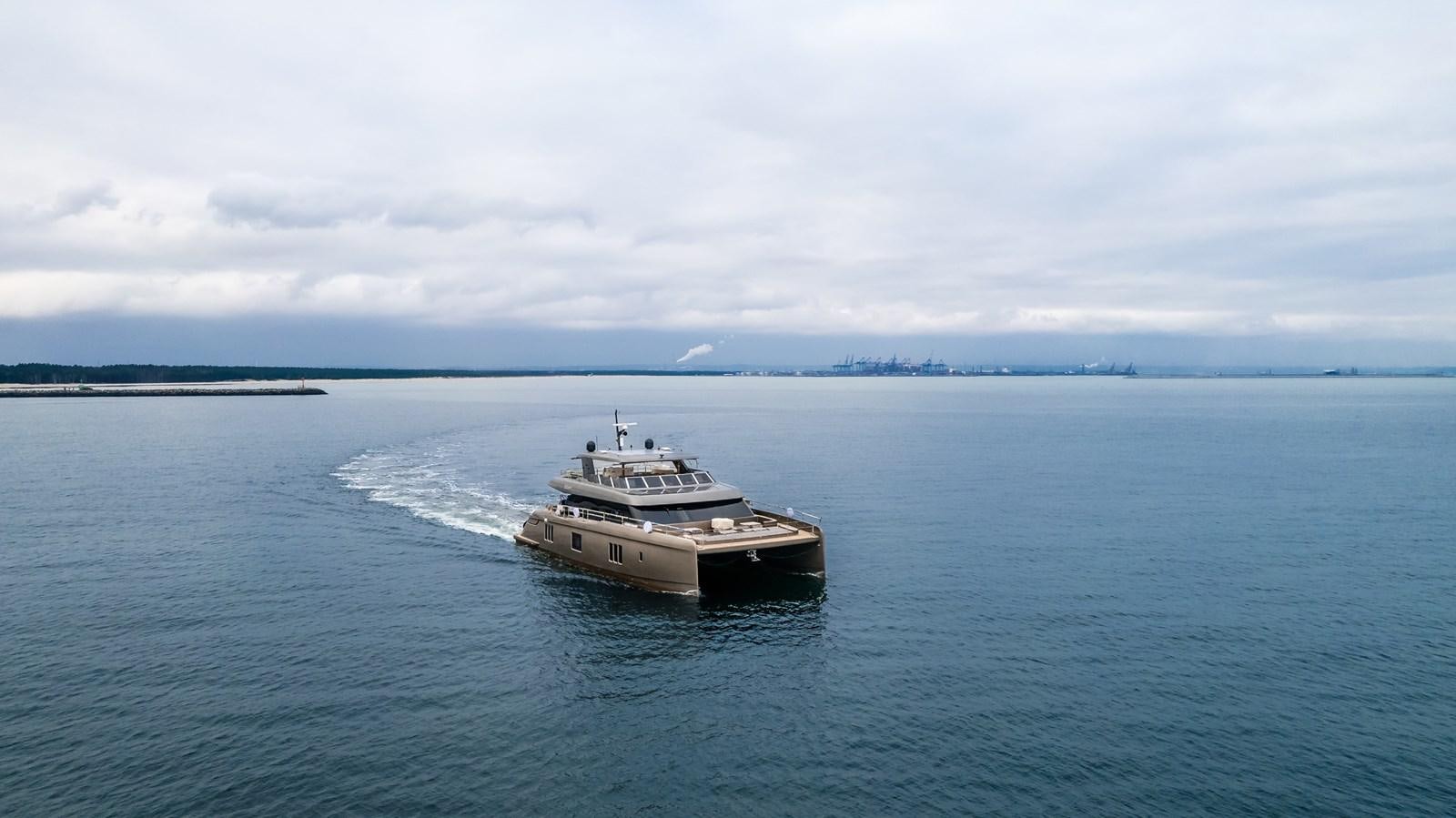 a boat in the water aboard SUNREEF 80 POWER Yacht for Sale
