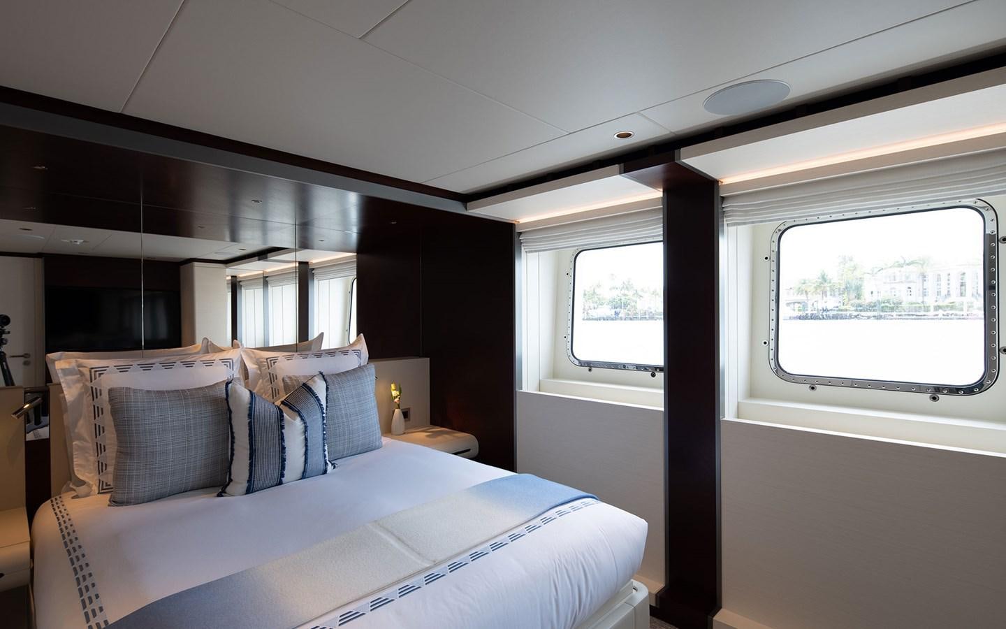 a bed in a room aboard BOOK ENDS Yacht for Sale