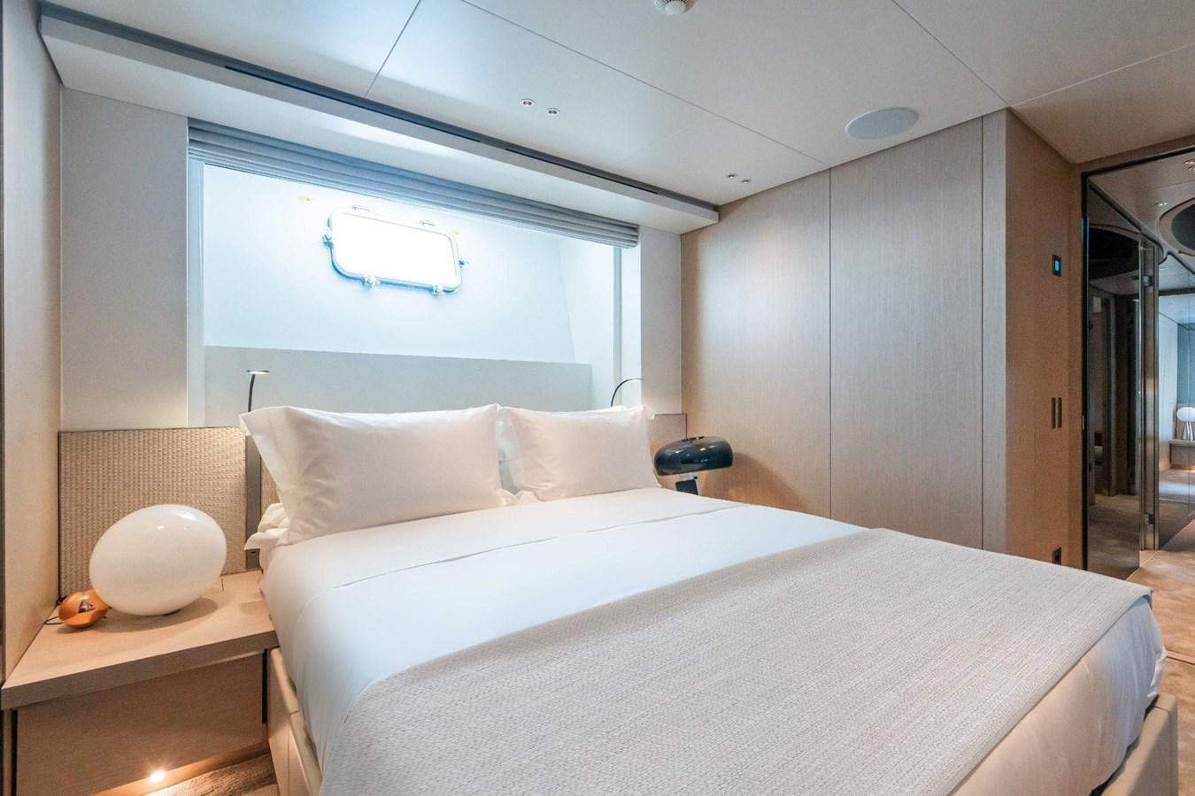 a bed in a room aboard AMI Yacht for Sale