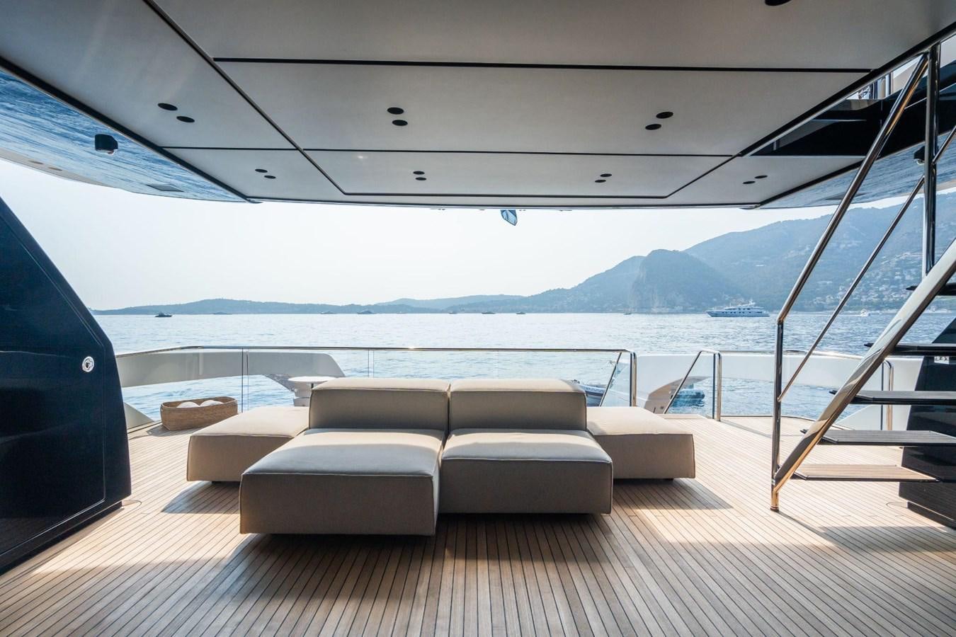 a room with a view of the ocean and mountains aboard AMI Yacht for Sale