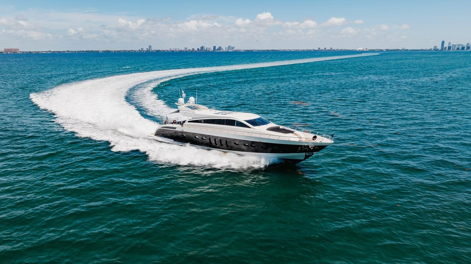 a white boat on the water aboard VENTURE Yacht for Sale