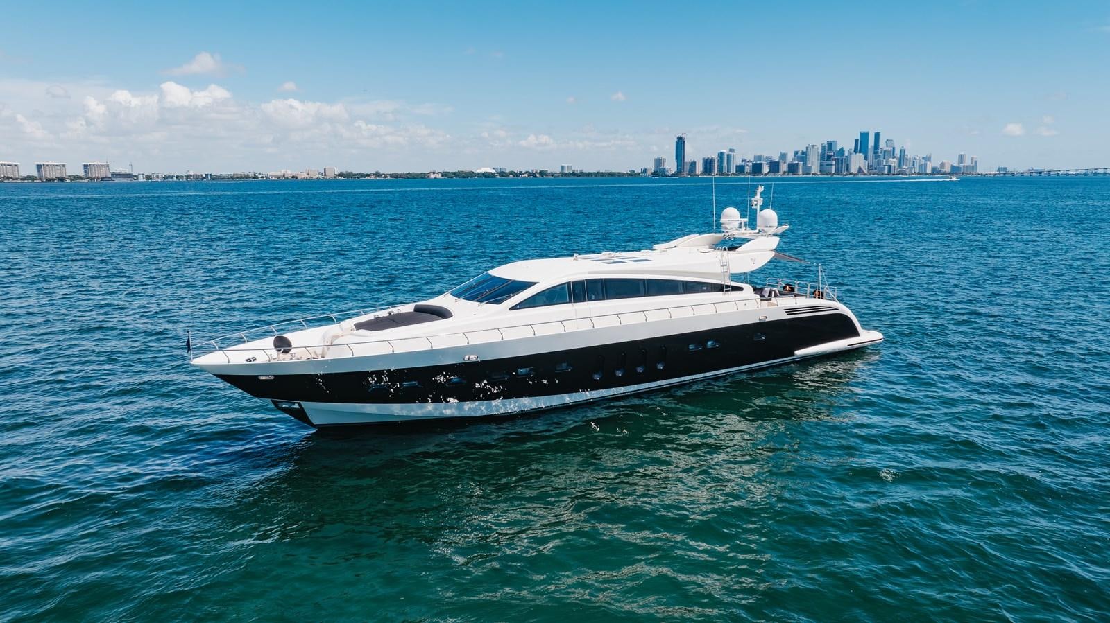 a white yacht in the water aboard VENTURE Yacht for Sale