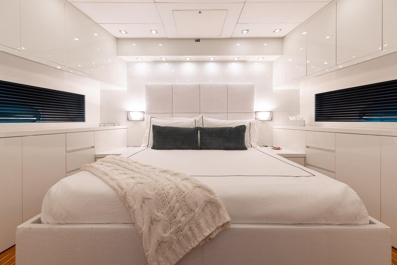 a room with two beds aboard VENTURE Yacht for Sale