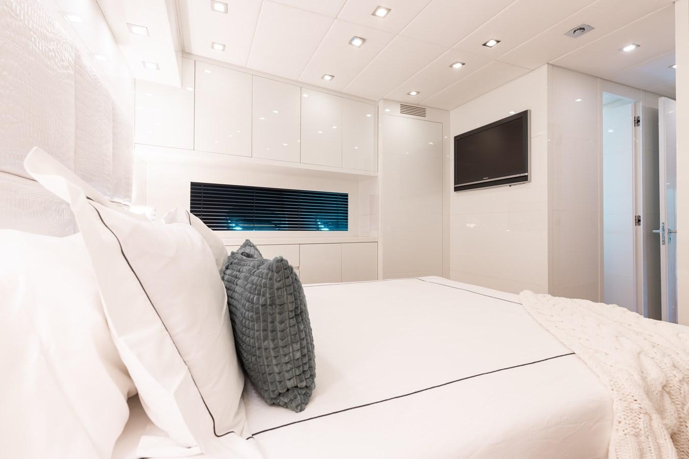 a bed in a room aboard VENTURE Yacht for Sale