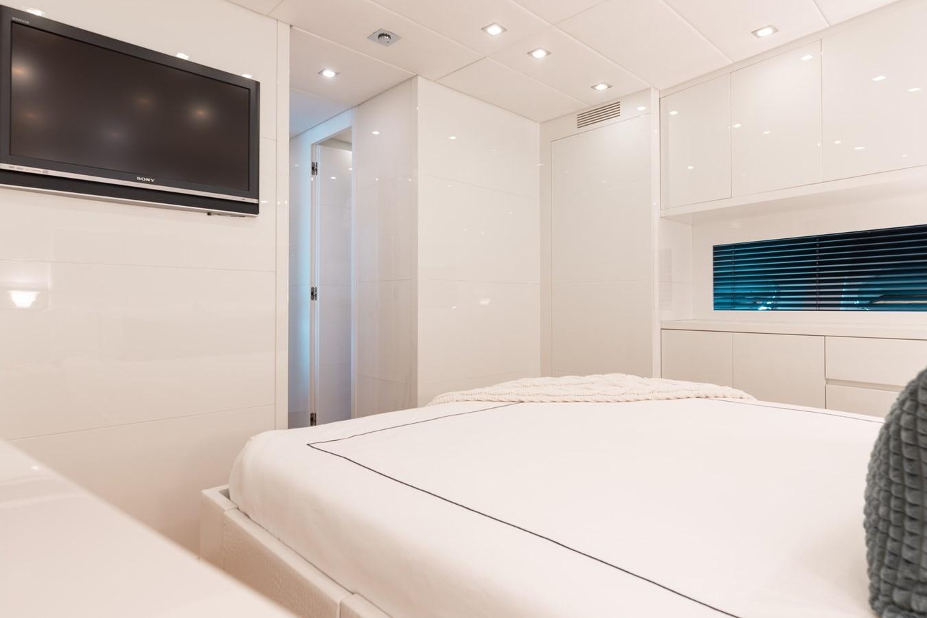 a bed in a room aboard VENTURE Yacht for Sale