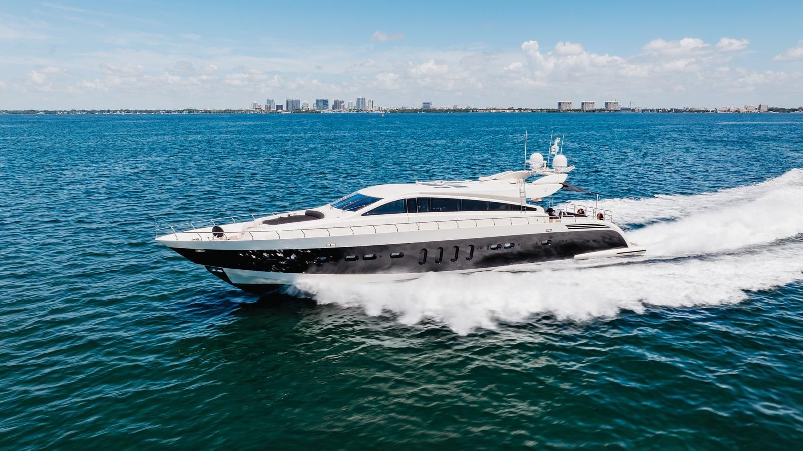 a white yacht in the water aboard VENTURE Yacht for Sale