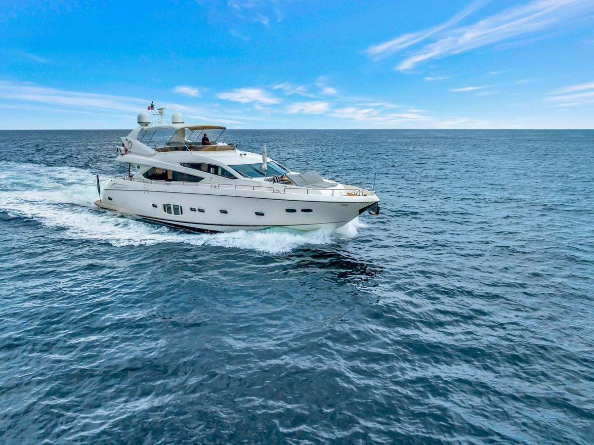 a white boat on the water aboard QUATTRO Yacht for Sale
