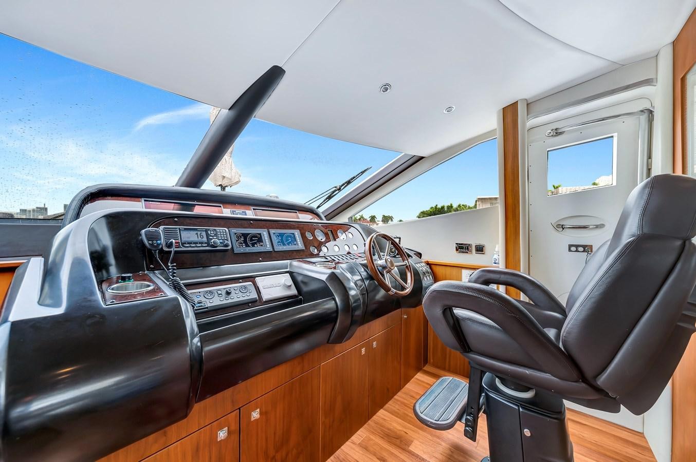 the inside of a car aboard QUATTRO Yacht for Sale