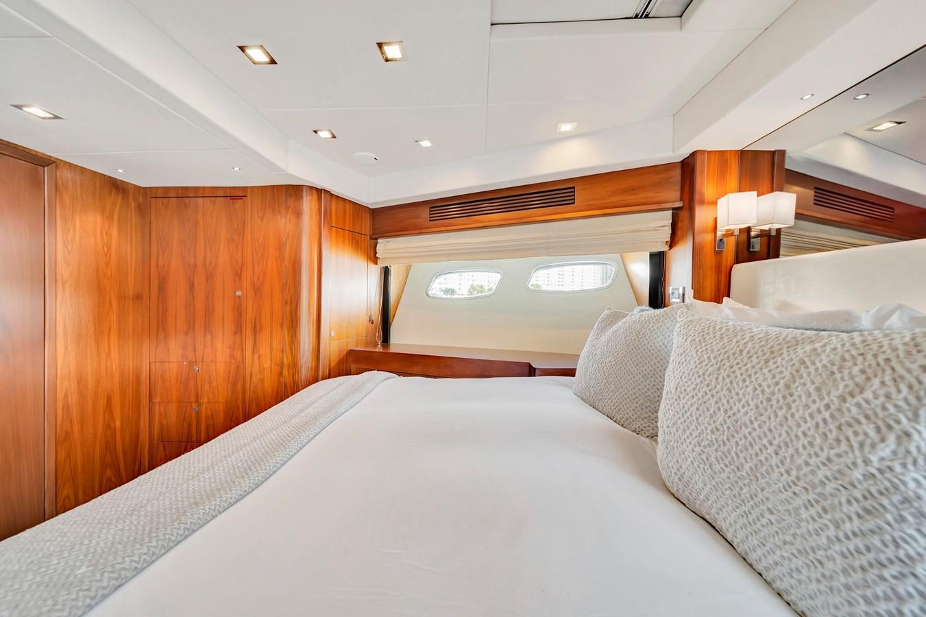 a bed in a room aboard QUATTRO Yacht for Sale