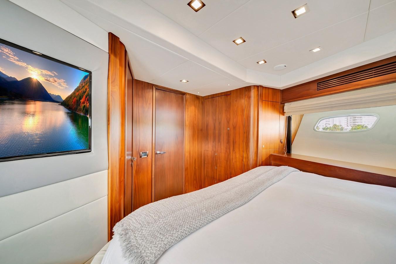 a bed in a room aboard QUATTRO Yacht for Sale