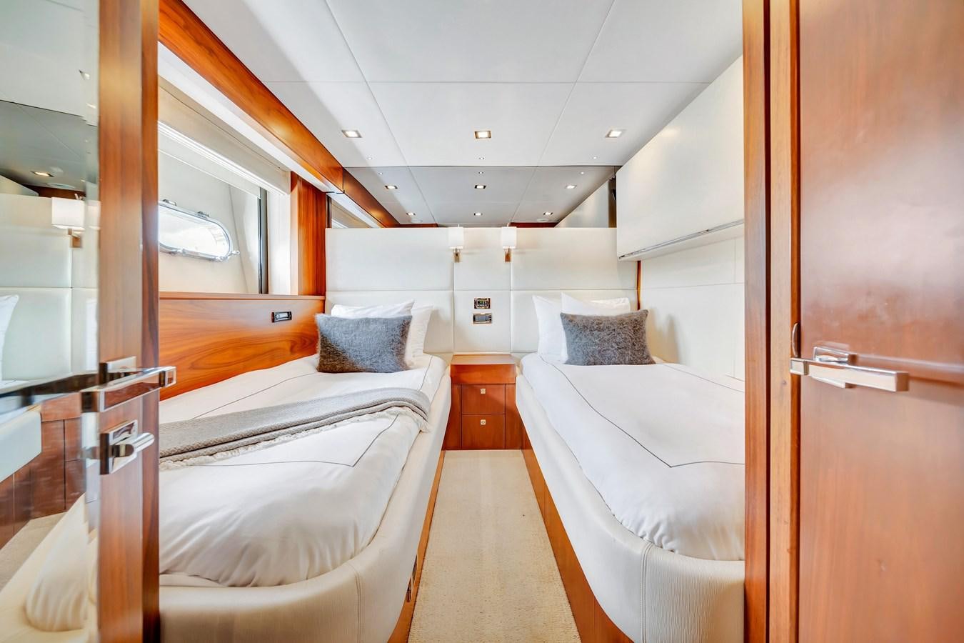 a room with two beds aboard QUATTRO Yacht for Sale