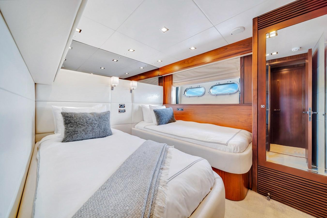 a room with two beds aboard QUATTRO Yacht for Sale